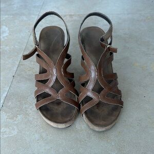 Strappy brown wedge shoes by aerosoles